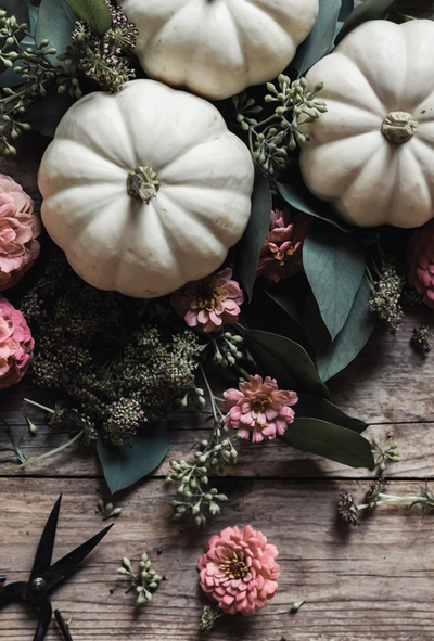 White pumpkins and flowers